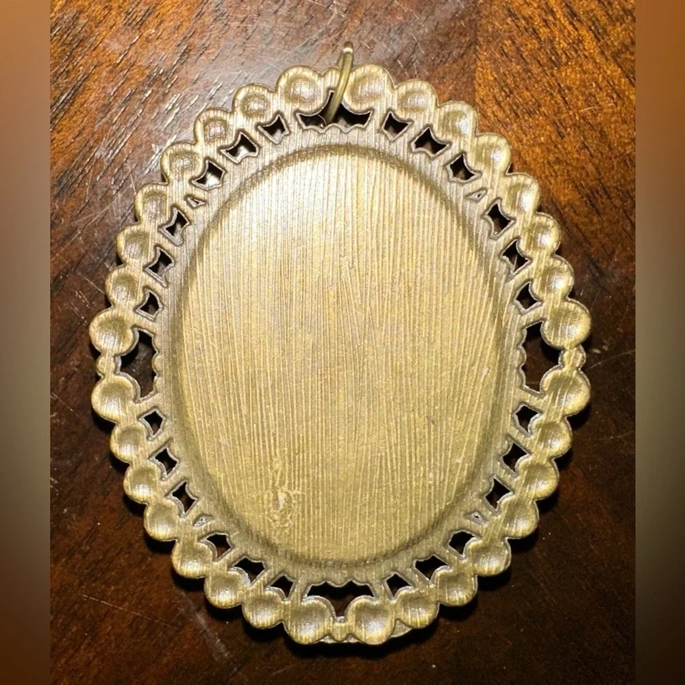 Bronze Oval Pendant | Afrocentric Goddess with Afro Puffs & Crown | Resin Sealed